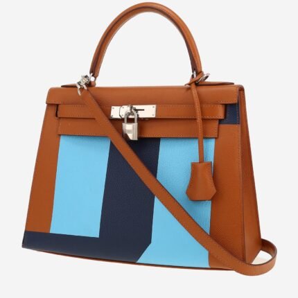 Hermès Kelly 28 cm Letter S Kellygraphie handbag in gold and dark blue epsom leather and light blue Mysore leather