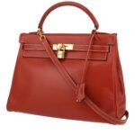 Hermès Kelly 32 cm handbag in brick red box leather