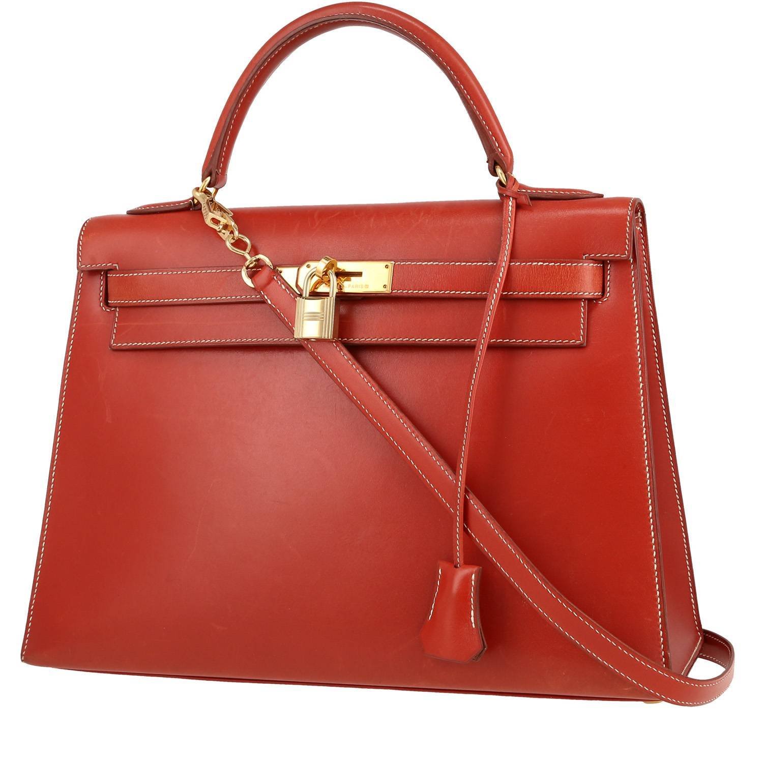 Hermès Kelly 32 cm handbag in brick red box leather Hermès Kelly 32 cm handbag in brick red box leather