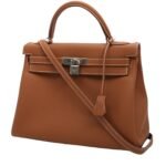 Hermès Kelly 32 cm handbag in gold togo leather