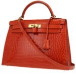 Hermès Kelly 32 cm handbag in orange porosus crocodile